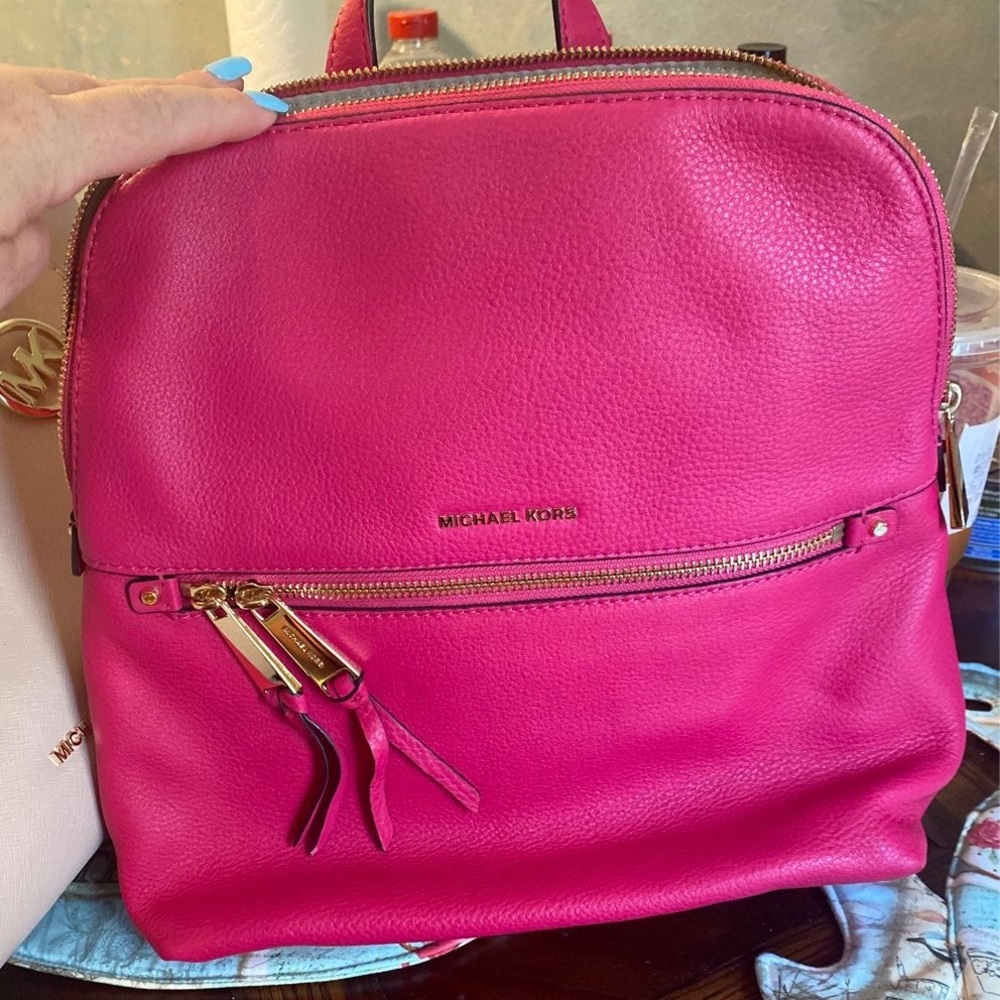 Great condition with beautiful pink color Michael Kors Back Pack.